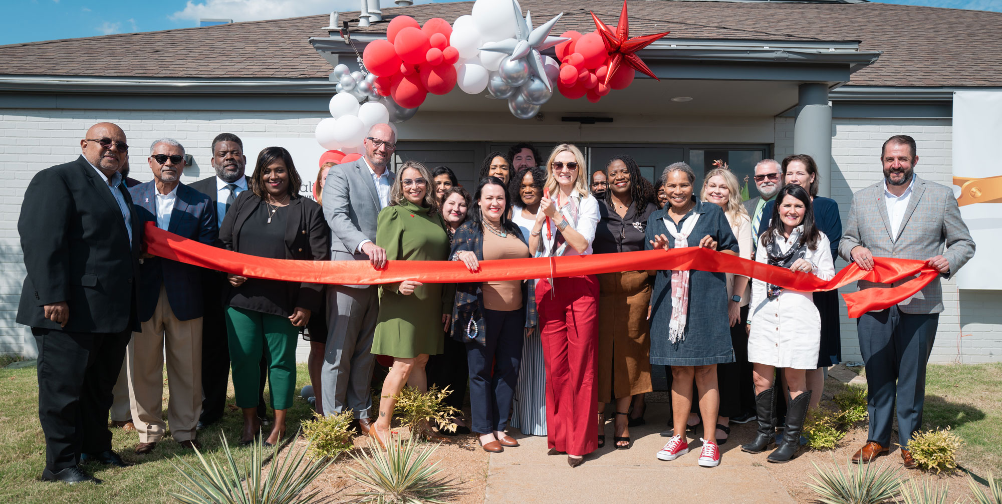 Photo depicts a ribbon cutting at the new Innovation and Talent Center in Fort Worth